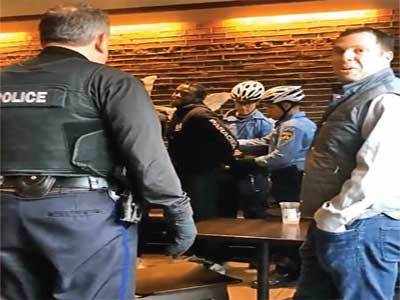 Starbucks CEO apologizes for arrests of 2 black men