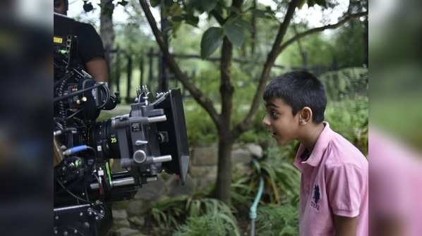 Ajay Devgn's son Yug seems to be hypnotised by the camera lens