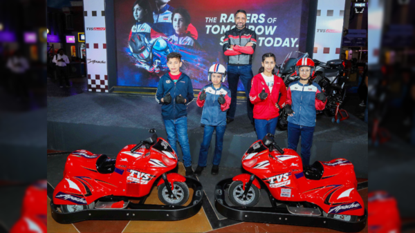 Vimal Sumbly, Head Business - Premium, TVS Motor Company with four young participants. Vimal Sumbly, Head Business - Premium, TVS Motor Company with four young participants.