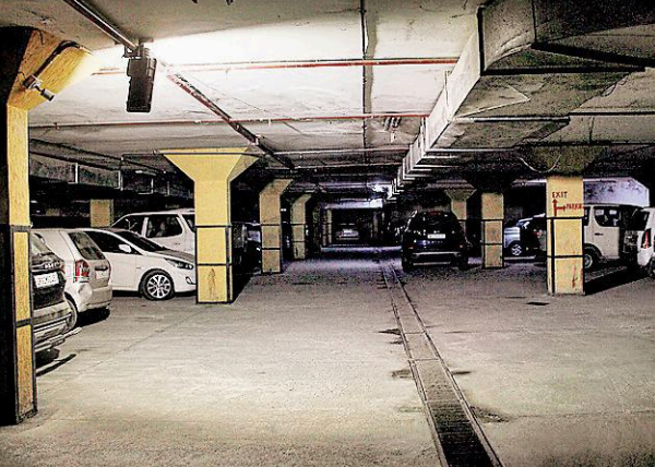 Why do people prefer to park on roads & cause snarls? Because it’s easier and free