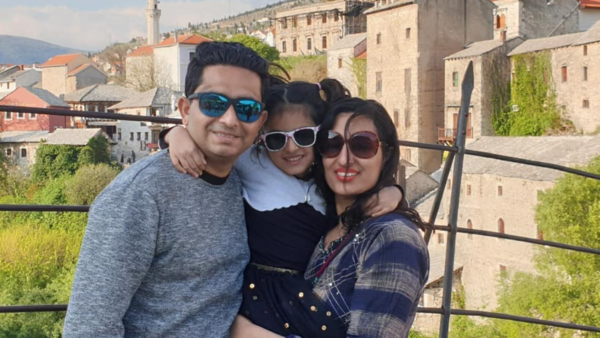 Aditi Tripathi with her parents