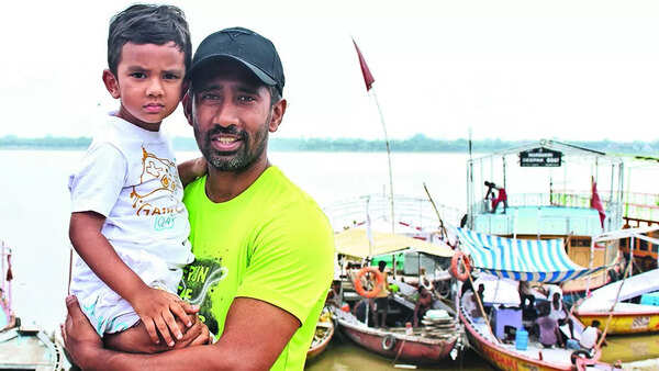 With his kid at Assi Ghat