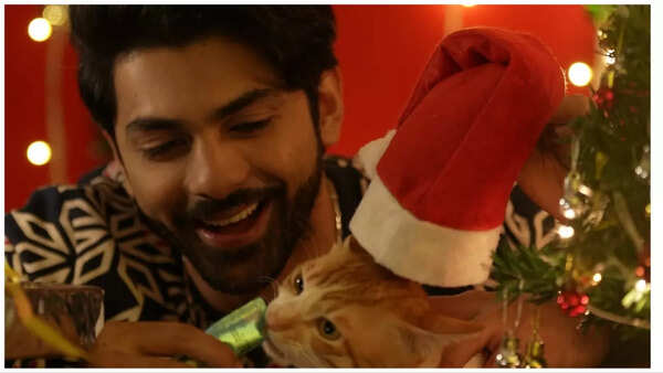 Taha Shah and his cat