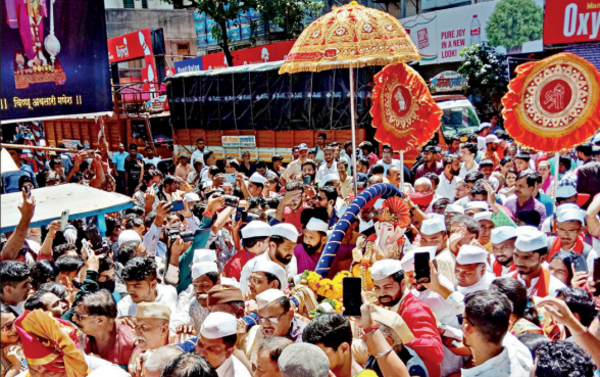 Bappa comes home amid cheer, grand display of devotion in city