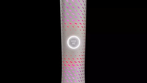 Kiss Me button on trophy