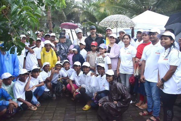 Actor Arjun Rampal and Filmmaker Rahul Mittra pose with students