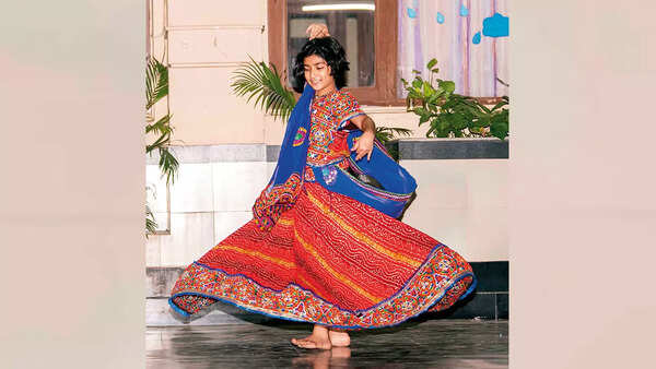 Children are learning garba and dandiya steps at workshops