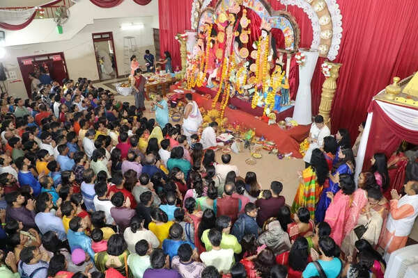 Crowds attend a Durga Puja celebration