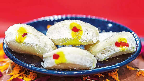 Juicy, soft, creamy cham cham, like many other Bengali sweets is made using chhena and dipped in sugar syrup. The filling is made of khoya, flavoured with caradamom, saffron and pistachios