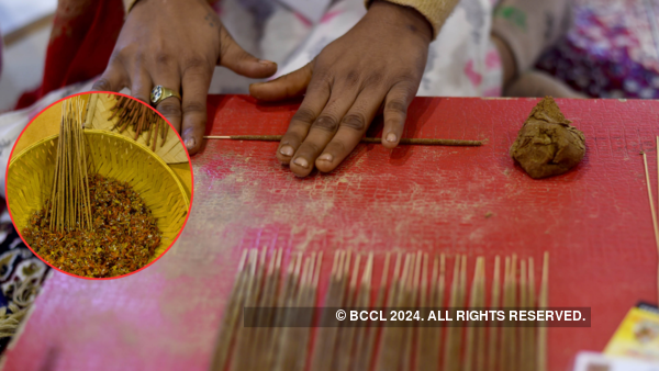 Waste to wealth: A woman was making incense sticks using waste flowers