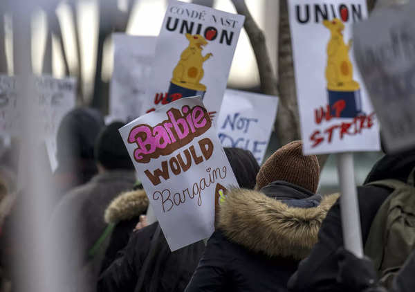 Unionized staff at Condé Nast walk the picket line during a 24-hour walk out amid layoff announcements, in front of the Condé Nast offices at One World Trade Center New York City on January 23, 2024.