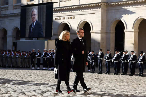 French President Emmanuel Macron and his wife Brigitte Macron attend a national tribute ceremony for late French minister and European Union Commission president Jacques Delors at the Hotel des Invalides in Paris, on January 5, 2024.