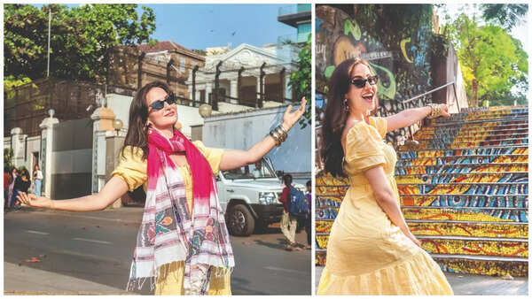 Elli strikes the classic SRK pose outside his residence Mannat and revisits the iconic steps in Bandra