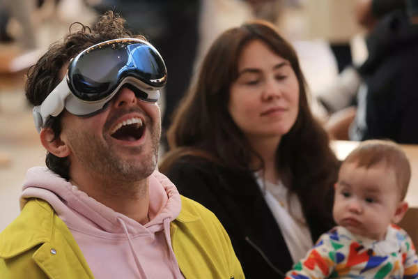 A customer tries his Vision Pro at the launch of the Apple Vision Pro at Apple The Grove in Los Angeles, California, on February 2, 2024.