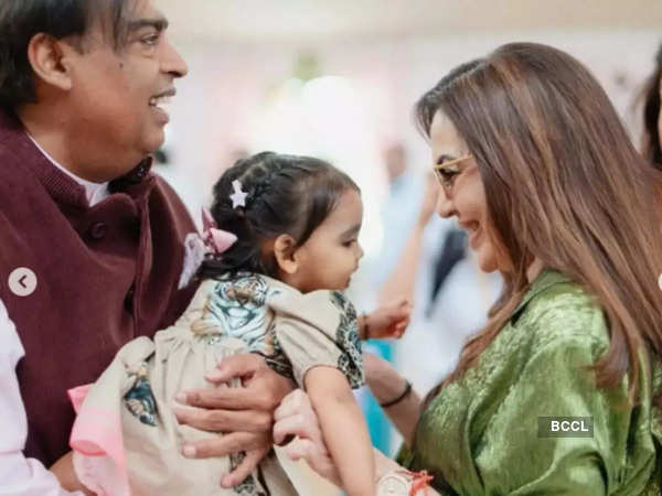 Mukesh and Nita Ambani with their grand-daughter