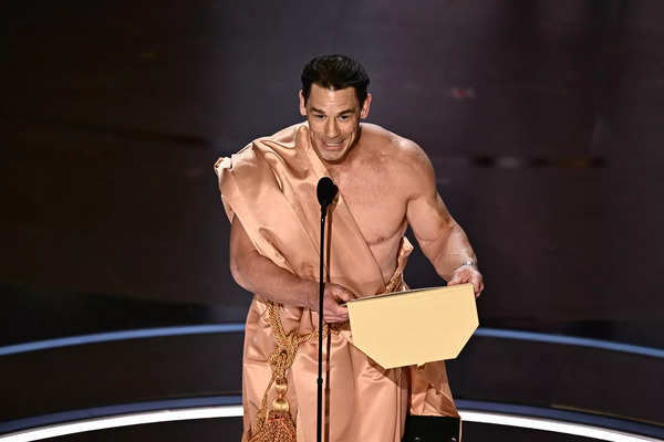 John Cena Naked on Oscars 2024 Stage: ​Oscars 2024: John Cena goes nude to  present Best Costume Award | - Times of India