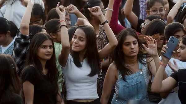 Students danced with the singer