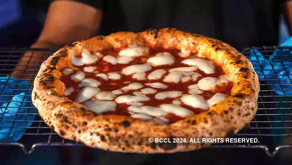 Ambassadors, guests, friends were seen trying the Neapolitan pizza