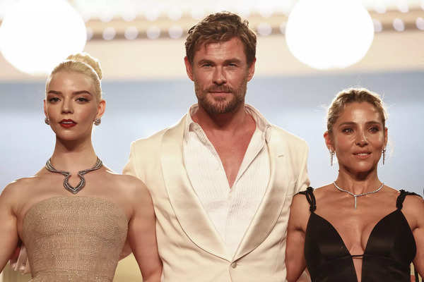 Spanish actress Elsa Pataky (L), Australian actor Chris Hemsworth (C) and British-US actor Anya Taylor-Joy pose after the screening of the film "Furiosa: A Mad Max Saga" at the 77th edition of the Cannes Film Festival in Cannes, southern France, on May 15, 2024.