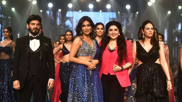 Arvind Singh & Kajal Singh joined by Chitrangda Singh, who walked the ramp as a showstopper for KRASA presents Archana Kochhar’s show