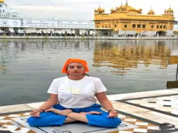 Complaint filed against fashion designer for performing yoga at Golden  Temple - The Times of India
