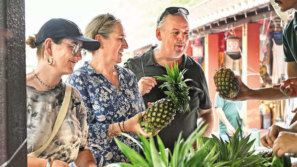Tourists were seen buying Kew pineapples