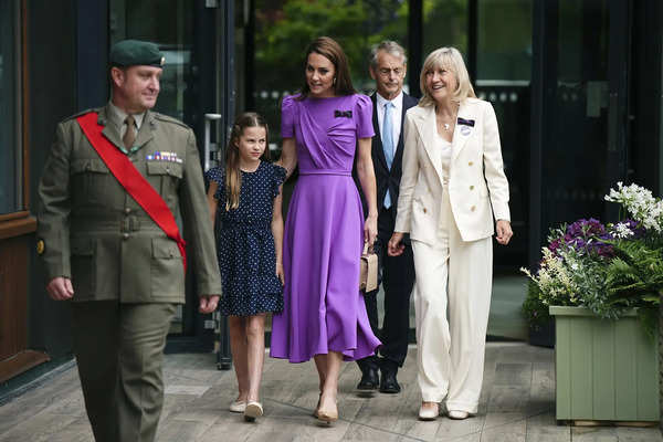 Kate, the Princess of Wales, hands Carlos Alcaraz his Wimbledon trophy in a rare appearance for her