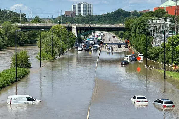 Power outage, flooded roads: Toronto submerged as rain sets new record ...