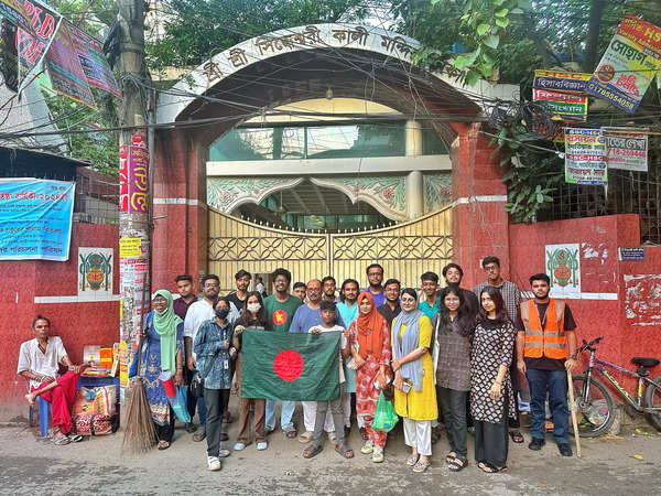 Goswami (in centre) with a group of students guarding the temple and locality.