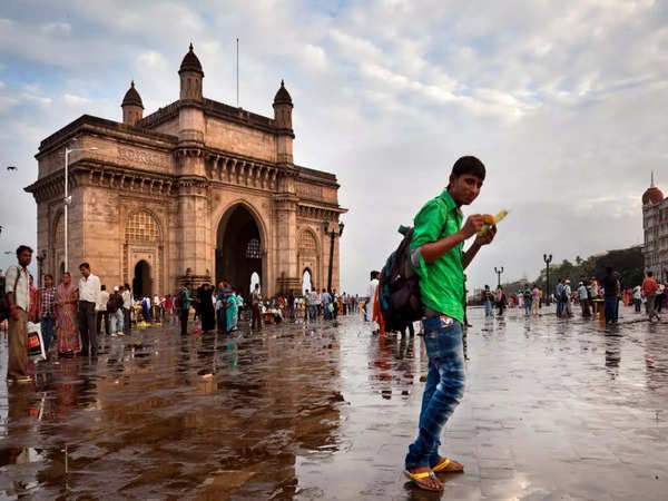 Visit the Gateway of India and Colaba region