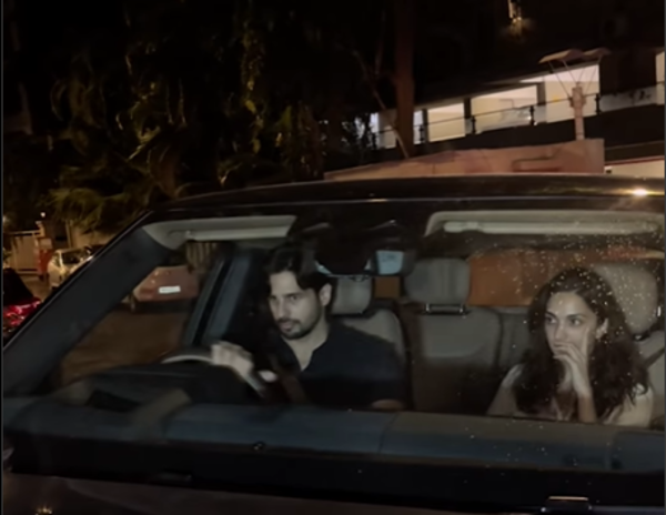 Sid and Kiara enjoy a night ride in their new car