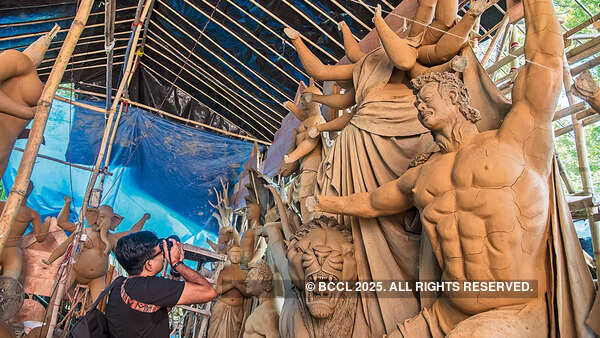 If you visit the area during this time, you will find many photographers walking around documenting the making of Maa idols If you visit the area during this time, you will find many photographers walking around documenting the making of Maa idols