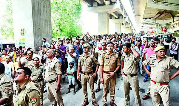 Woman falls off 30ft flyover and lands on pillar, rescued