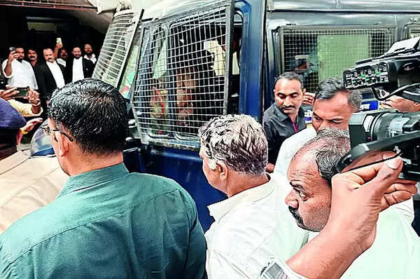 School chairman Uday Kotwal and secretary Tushar Apte in POCSO court