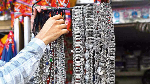 Metalic waist chains go with jeans as well as skirts