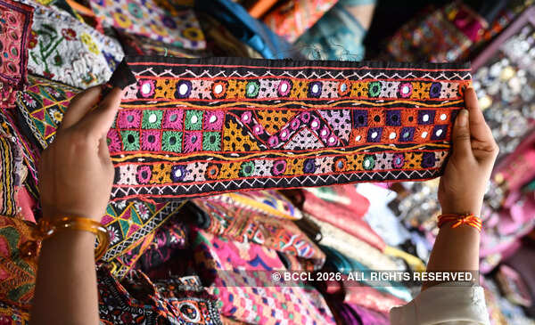 Use Kutchi work borders to give a festive spin to your regular clothes or create bows, chokers and hair pins out of it