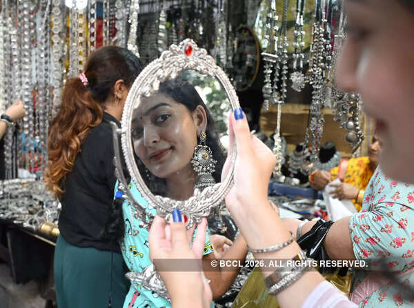 Wear heavy jhumkas with intricately embroidered ensembles