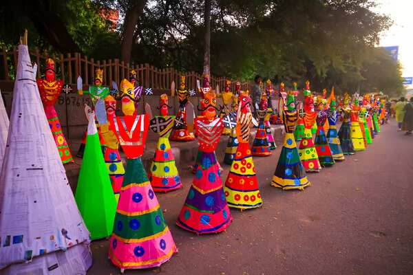The alleys of Tagore Garden metro station turns into a open art gallery for two months with artisans creating hundreds of brightly coloured effigies of Ravana, Meghnad and Kumbhakarana