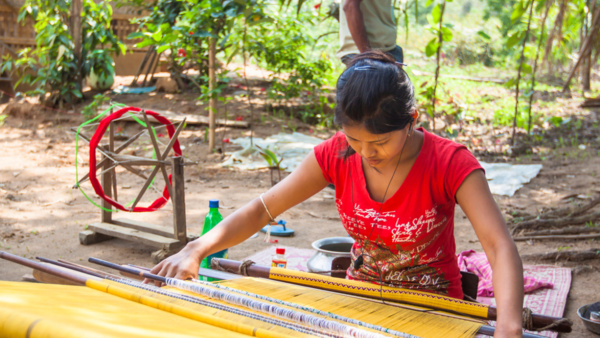 Tribal woman weaving