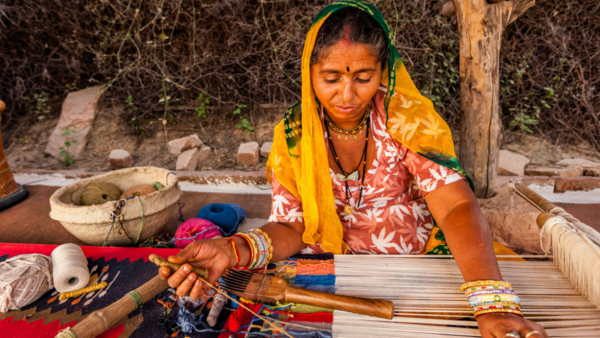 Indian woman weaving textiles