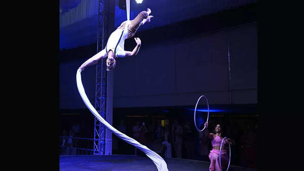 Aerialist Jason Bruegger and hula-hoop artist Eshna Kutty