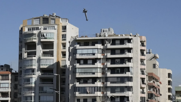 Missile can be seen above the building (Pic credit: AP)