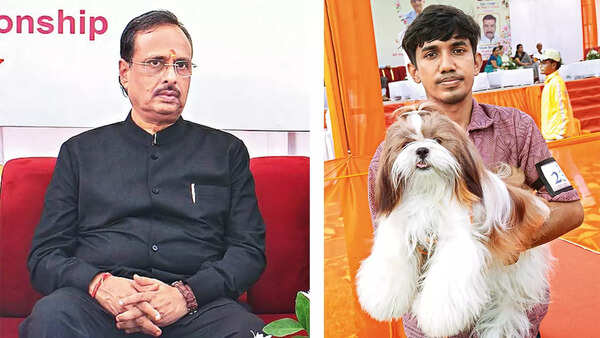 (L) Dr Dinesh Sharma (R) Harsh Kumar Vermashows off Maxie, a Shih Tzu