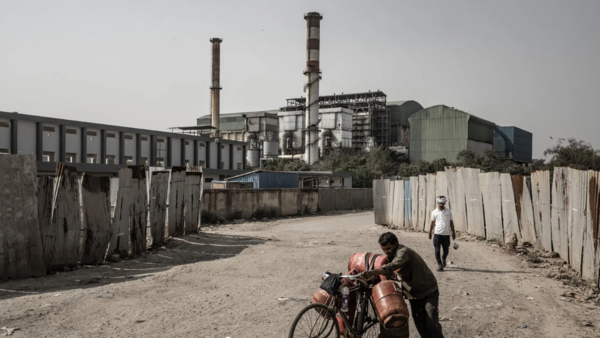 Outside the Timarpur-Okhla Waste to Energy Plant in 2023.