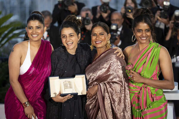 Filmmaker Payal Kapadia with Divya Prabha, Chhaya Kadam and Kani Kusruti after the awards ceremony at the 77th international film festival, Cannes.