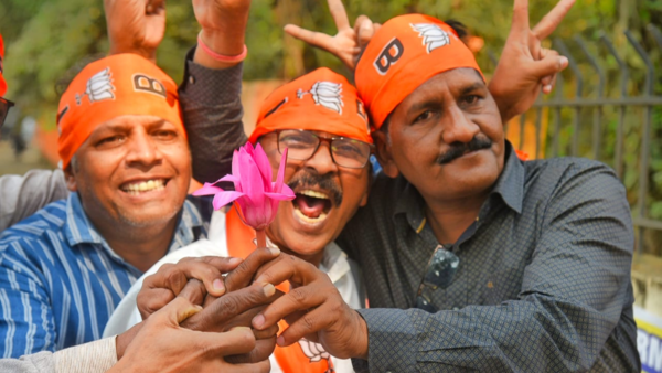 BJP workers celebrate the landslide victory achieved by the BJP and Mahayuti alliance in the Maharashtra Assembly elections in Nagpur.