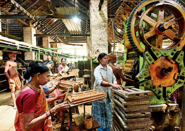 Women engaged in tile making