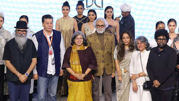 Amrit Raj, Development Commissioner (Handicrafts), and Sunil Sethi, Chairman, FDCI, with designers who presented the show