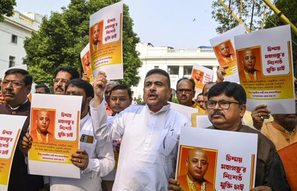 West Bengal leader of opposition Suvendu Adhikari (centre) with BJP MLAs protest against the arrest of Chinmoy Krishna Das Brahmachari in Bangladesh. (PTI)