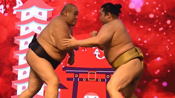 Sumo wrestlers Yoshinori Tashiro and Ryusuke Soma displayed their strength, tricks and flexibility on stage